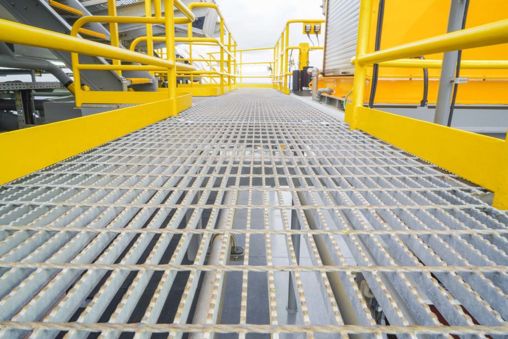steel grating yellow handrails