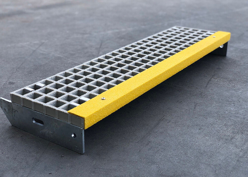 Steel stair tread grating stair with yellow FRP nosing attached