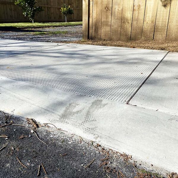 FRP grating used on footpath to protect tree roots.