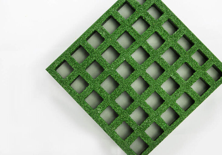 Sample piece of FRP green heavy duty mesh grating.