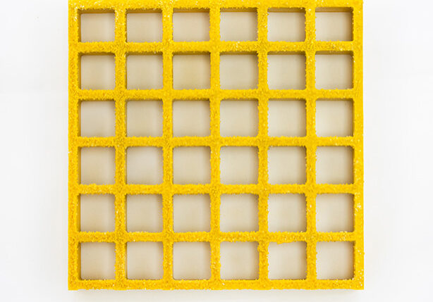 Sample piece of yellow FRP regular mesh grating.