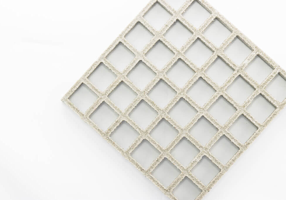 FRP Regular Mesh Grating placed diagonally on a white background.