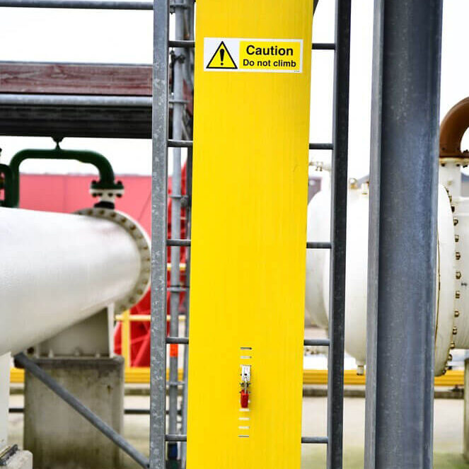 Yellow ladder guard by CableSafe.